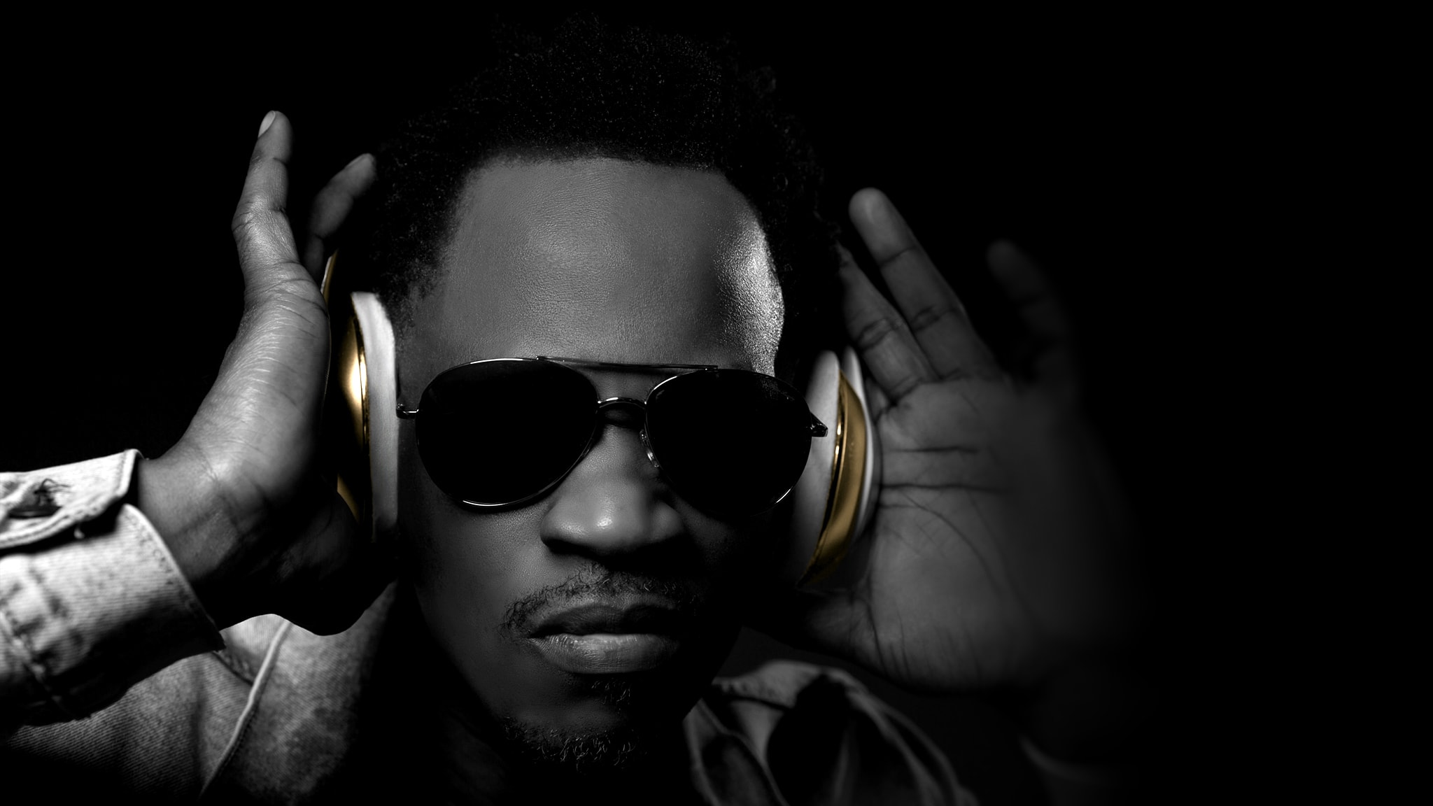 DJ Kurupt with headphones and sunglasses